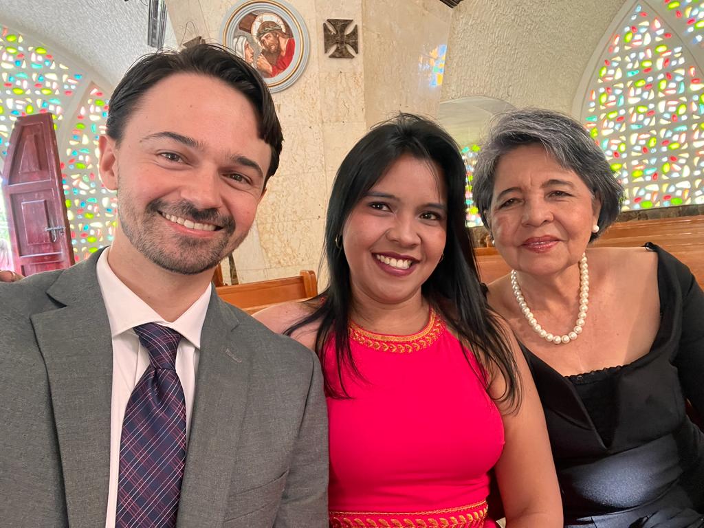 Sitting in a church. 